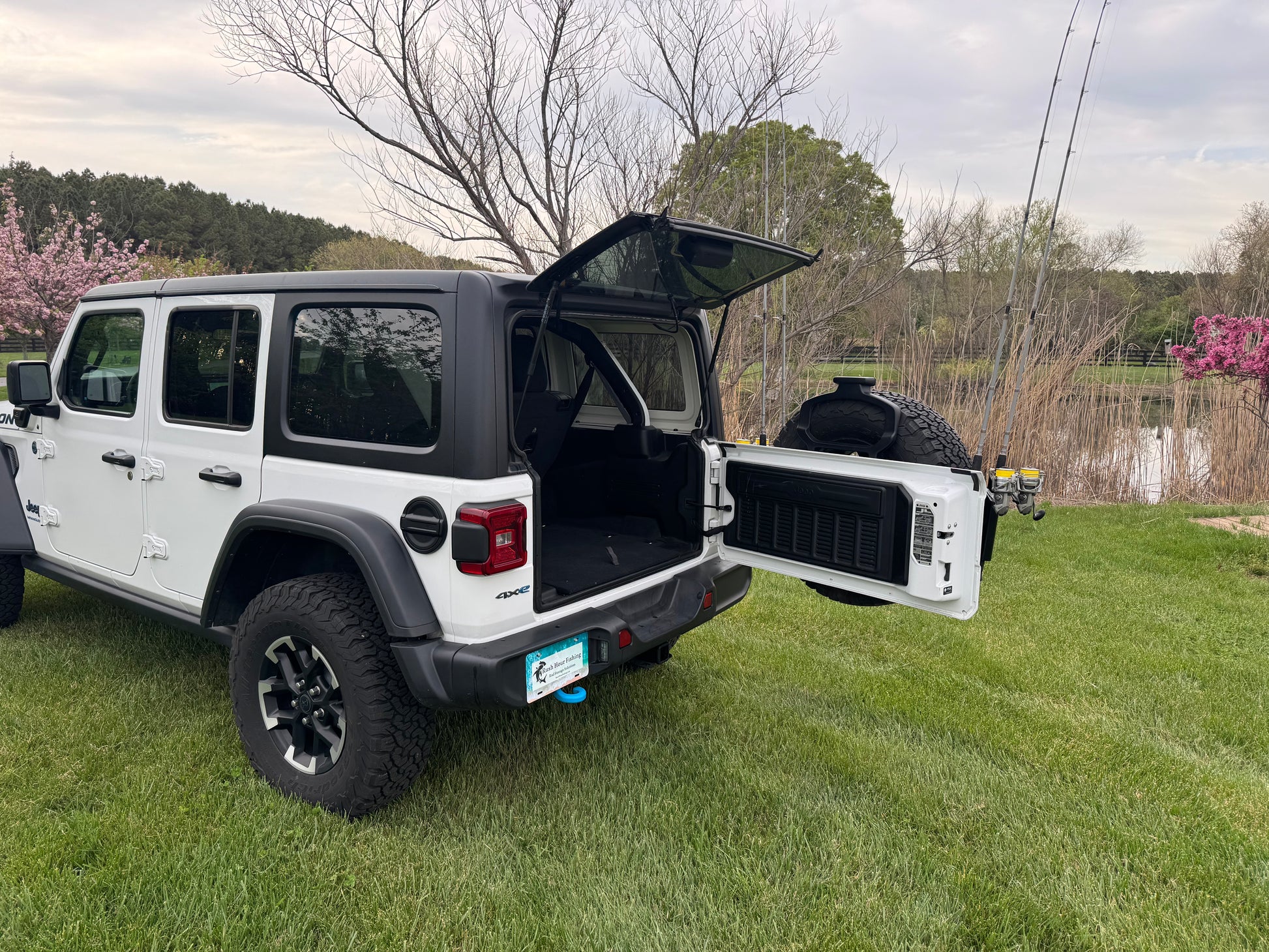 jeep spare tire fishing rod holder Spare Tire Fishing Rod Rack for Bronco & Jeep – Rush Hour Fishing